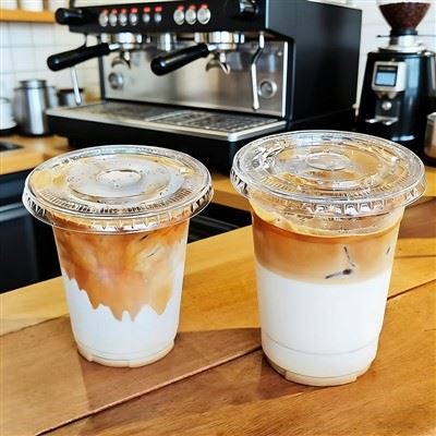 Infusion froide jetable de tasses de café glacées en plastique d'ANIMAL FAMILIER clair